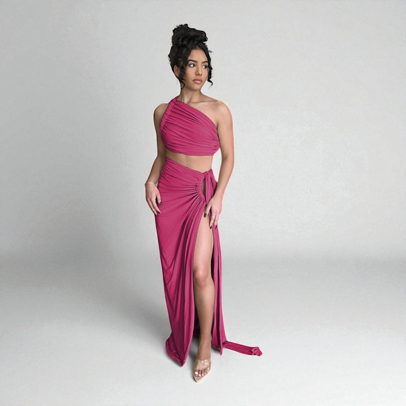 Este Conjunto de Dos Piezas en vibrante color
(Rosa, Verde) combina sensualidad y elegancia.